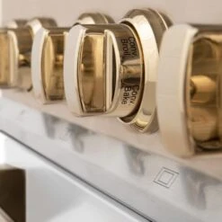 ZLINE Autograph Edition 36 In. Kitchen Package With Stainless Steel Dual Fuel Range With White Matte Door, Range Hood And Dishwasher With Polished Gold Accents (3AKP-RAWMRHDWM36-G)(Zline Autograph Edition 36 Kitchen Package Stainless Steel White Matte Gold 3akp Rawmrhdwm36 G) -Induction Cooktop Store zline professional stainless steel dual fuel range RAZ WM 36 G detail knobs 3 1